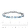 Thumbnail Image 2 of Swiss Blue Topaz and White Lab-Created Sapphire Alternating Line Bracelet in Sterling Silver - 7.25"