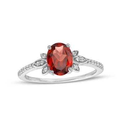 Oval Garnet and 0.086 CT. T.W. Diamond Leaf-Sides Floral Ring in 10K White Gold