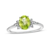 Thumbnail Image 0 of Oval Peridot and 0.086 CT. T.W. Diamond Leaf-Sides Floral Ring in 10K White Gold