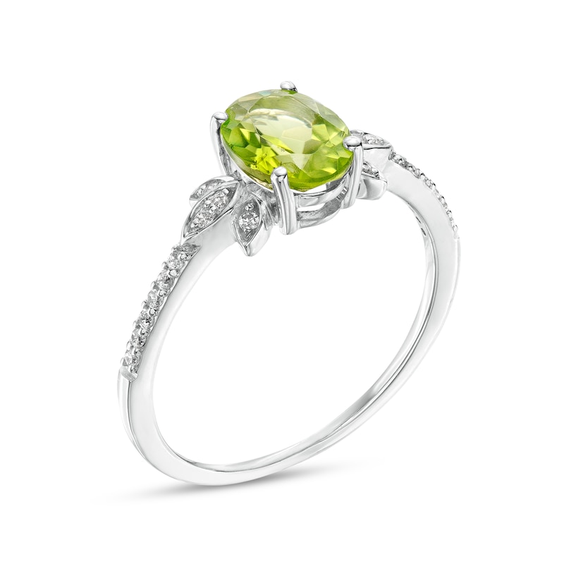 Oval Peridot and 0.086 CT. T.W. Diamond Leaf-Sides Floral Ring in 10K White Gold