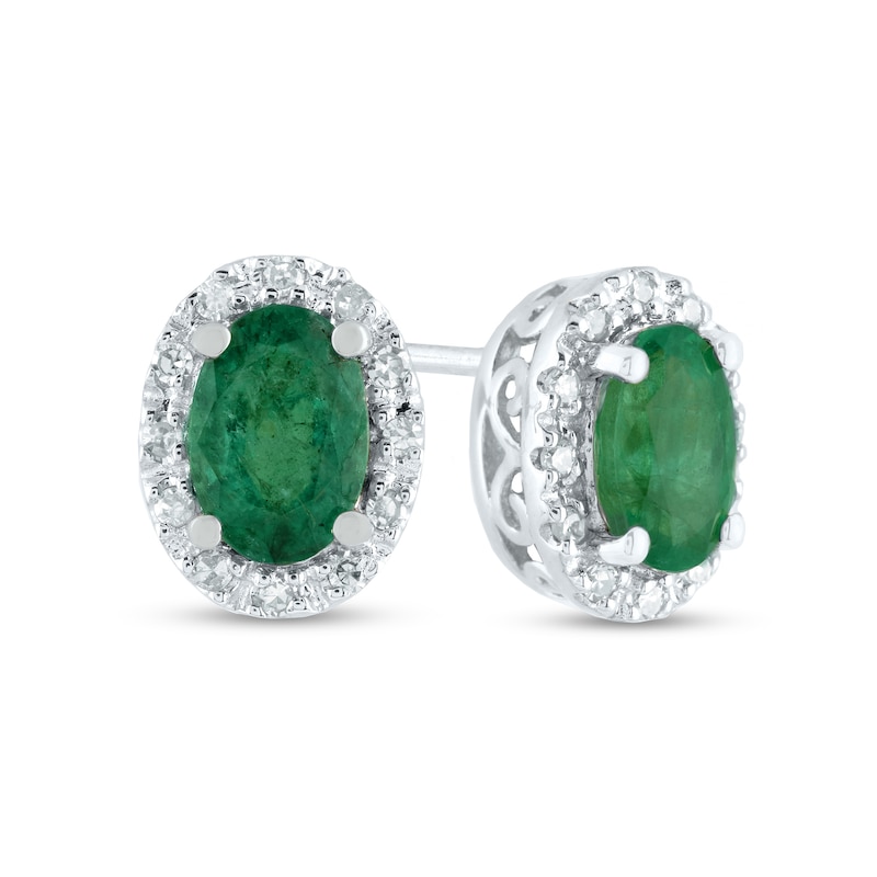 Oval Emerald and 0.10 CT. T.W. Diamond Frame Stud Earrings in 14K Gold|Peoples Jewellers