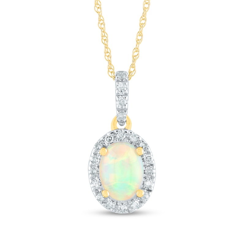 Oval Opal and 0.12 CT. T.W. Diamond Frame Drop Pendant in 14K Gold