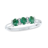Thumbnail Image 0 of Oval Emerald and 0.08 CT. T.W. Diamond Three Stone Ring in 14K White Gold