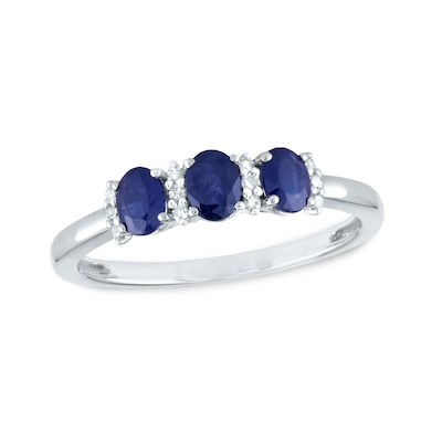 Oval Blue Sapphire and 0.08 CT. T.W. Diamond Three Stone Ring in 14K Gold