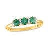 Thumbnail Image 1 of Oval Emerald and 0.08 CT. T.W. Diamond Three Stone Ring in 14K Gold