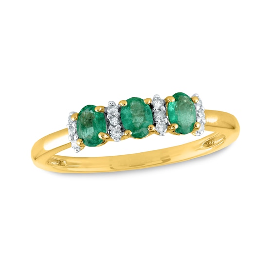 Oval Emerald and 0.08 CT. T.W. Diamond Three Stone Ring in 14K Gold