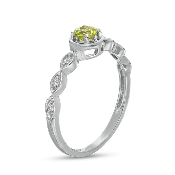 4.0mm Peridot and 0.04 CT. T.W. Diamond Marquise Ring in 10K White Gold