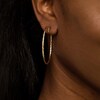 Thumbnail Image 1 of 50.0mm Diamond-Cut Inside-Out Tube Oval Hoop Earrings in 14K Gold