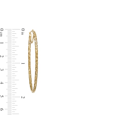 50.0mm Diamond-Cut Inside-Out Tube Oval Hoop Earrings in 14K Gold