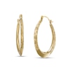 Thumbnail Image 0 of 26.06mm Diamond-Cut Knife Edge Tube Oval Hoop Earrings in 10K Gold