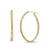 Thumbnail Image 1 of 30.0mm Diamond-Cut Inside-Out Tube Oval Hoop Earrings in Hollow 10K Gold