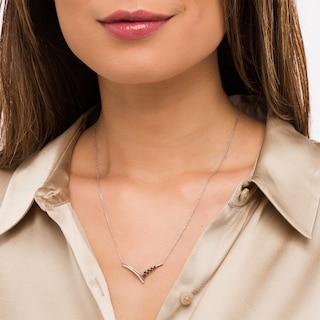 0.20 CT. T.W. Black Enhanced and White Diamond Chevron Necklace is fashioned in Sterling Silver