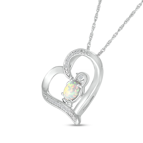 Oval Lab-Created Opal and 0.04 CT. T.W. Diamond Penguin in Tilted Heart Outline Pendant in Sterling Silver