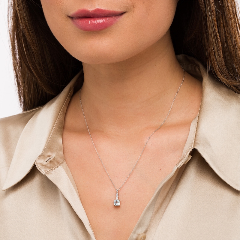 6.0mm Cushion-Cut Aquamarine and 0.08 CT. T.W. Baguette and Round Diamond Drop Pendant in 14K White Gold|Peoples Jewellers