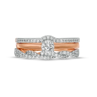 0.45 CT. T.W. Diamond Twist Three Piece Bridal Set in 10K Rose Gold (J/I3)