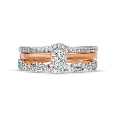 0.45 CT. T.W. Diamond Twist Three Piece Bridal Set in 10K Rose Gold (J/I3)