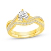 Thumbnail Image 1 of 0.78 CT. T.W. Diamond Twist Shank Bypass Bridal Set in 14K Gold