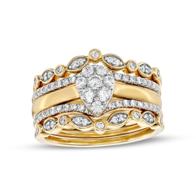 0.33 CT. T.W. Composite Pear-Shaped Diamond Contour Five Piece Bridal Set in 10K Gold