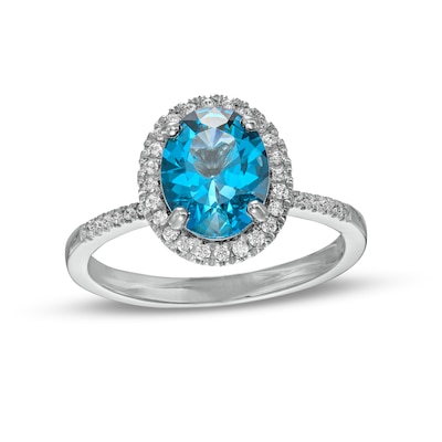 Oval London Blue Topaz and 0.23 CT. T.W. Diamond Framed Ring in 14K White Gold