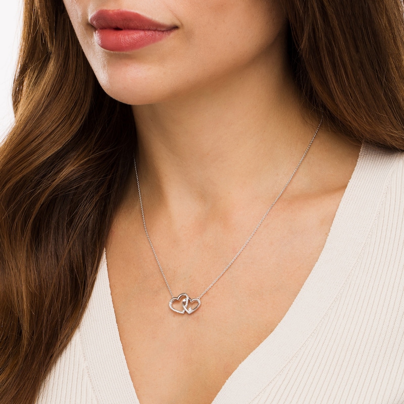 0.10 CT. T.W. Diamond Interlocking Hearts Necklace in Sterling Silver|Peoples Jewellers