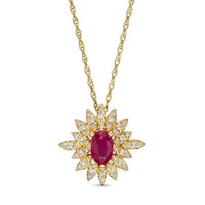 Oval Ruby and 0.20 CT. T.W. Diamond Starburst Pendant in 14K Gold