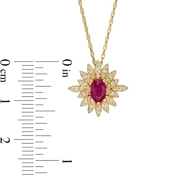 Oval Ruby and 0.20 CT. T.W. Diamond Starburst Pendant in 14K Gold