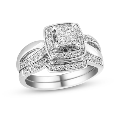 0.56 CT. T.W. Princess-Cut Quad Diamond Frame Twist Shank Bridal Set in 10K White Gold