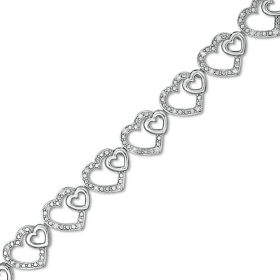 0.25 CT. T.W. Diamond Hearts Line Bracelet in Sterling Silver - 7.5"