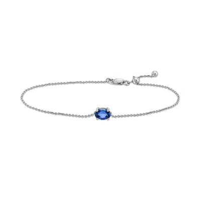 Sideways Oval Blue Lab-Created Sapphire Solitaire Adjustable Bracelet in 10K White Gold - 7.5"