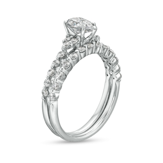 0.95 CT. T.W. Pear-Shaped Diamond Bridal Set in 14K White Gold (I/SI2)