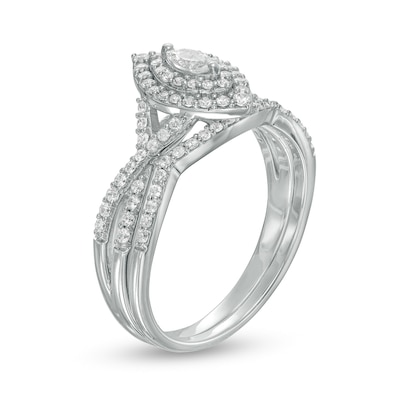 0.58 CT. T.W. Marquise Diamond Double Frame Twist Shank Bridal Set in 10K White Gold (I/I2)