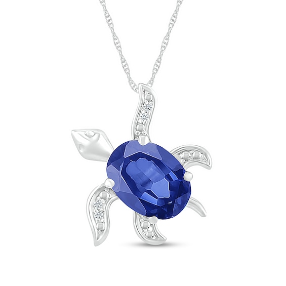 Oval Blue Lab-Created Sapphire and Diamond Accent Beaded Tilted Sea Turtle Pendant in Sterling Silver