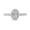 0.75 CT. T.W. Oval Diamond Frame Engagement Ring in Platinum (I/SI2)