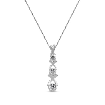 0.10 CT. T.W. Multi-Diamond Graduated Three Stone "XO" Drop Pendant in Sterling Silver