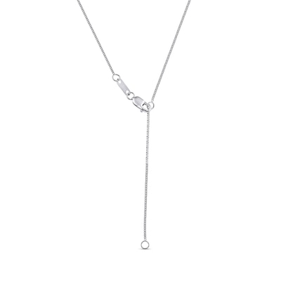 0.10 CT. T.W. Multi-Diamond Graduated Three Stone "XO" Drop Pendant in Sterling Silver