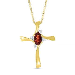 Oval Garnet and Diamond Accent Swirl Ribbon Cross Pendant in 10K Gold