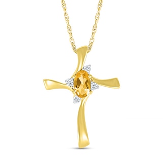 Oval Citrine and Diamond Accent Swirl Ribbon Cross Pendant in 10K Gold