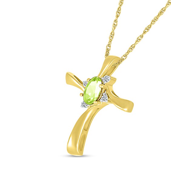 Oval Peridot and Diamond Accent Swirl Ribbon Cross Pendant in 10K Gold