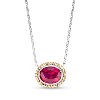 Oval-Shaped Lab-Created Ruby Solitaire Rope-Textured Frame Necklace in Sterling Silver and 10K Gold