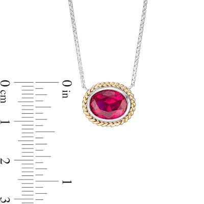 Oval-Shaped Lab-Created Ruby Solitaire Rope-Textured Frame Necklace in Sterling Silver and 10K Gold