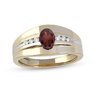 Men's Oval Garnet and 0.15 CT. T.W. Diamond Tri-Sides Grooved Band in 10K Two-Tone Gold