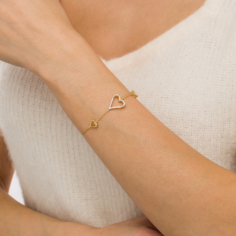 0.066 CT. T.W. Diamond Heart Trio Bracelet in 10K Gold – 7.5"|Peoples Jewellers