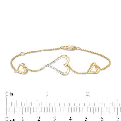 0.066 CT. T.W. Diamond Heart Trio Bracelet in 10K Gold – 7.5"