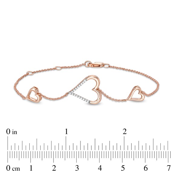 0.066 CT. T.W. Diamond Heart Trio Bracelet in 10K Rose Gold – 7.5"