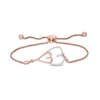 Thumbnail Image 0 of 0.145 CT. T.W. Diamond Double Elongated Heart Bolo Bracelet in Sterling Silver with 14K Rose Gold Plate – 9.5"