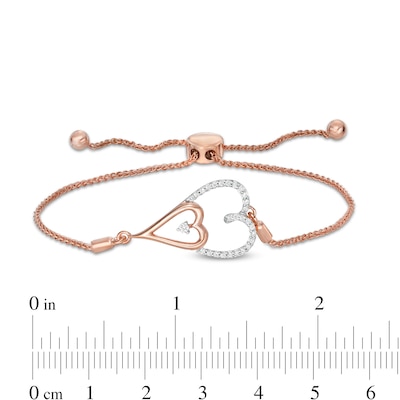 0.145 CT. T.W. Diamond Double Elongated Heart Bolo Bracelet in Sterling Silver with 14K Rose Gold Plate – 9.5"