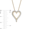 0.18 CT. T.W. Diamond Elongated Heart Sunburst Pendant in 10K Gold