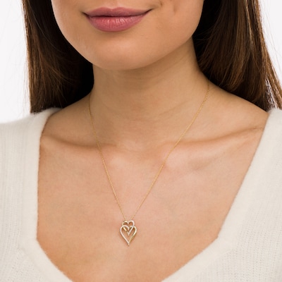 0.088 CT. T.W. Diamond Interlocking Double Elongated Heart Necklace in 10K Gold