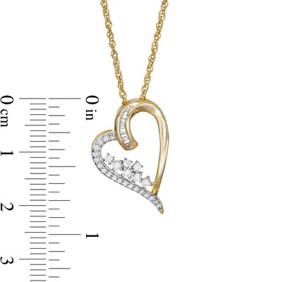 0.23 CT. T.W. Baguette and Round Diamond Tilted Scatter Heart Pendant in 10K Gold