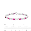 Thumbnail Image 3 of Oval Lab-Created Ruby and 0.18 CT. T.W. Diamond Infinity Ribbon Link Line Bracelet in Sterling Silver – 7.5"
